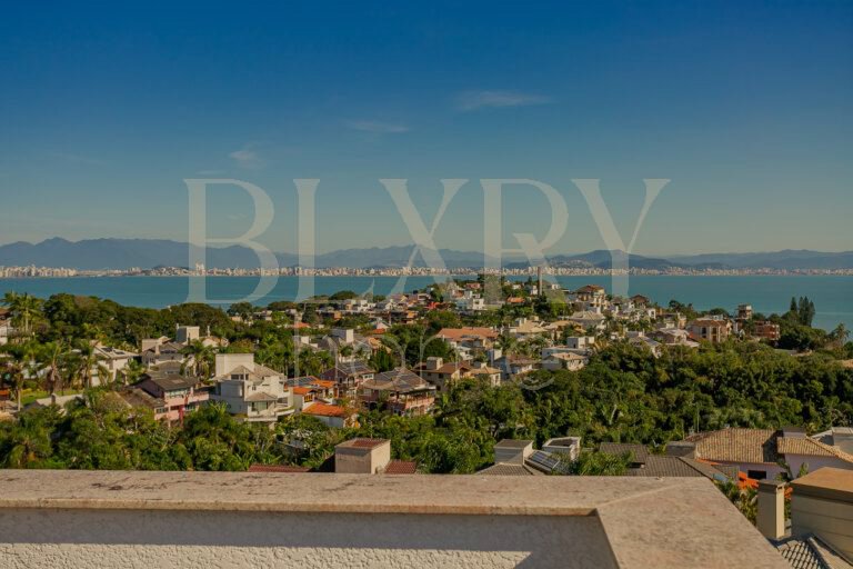 Casa no Cacupé com vista mar