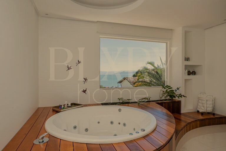 Casa no Cacupé com vista mar